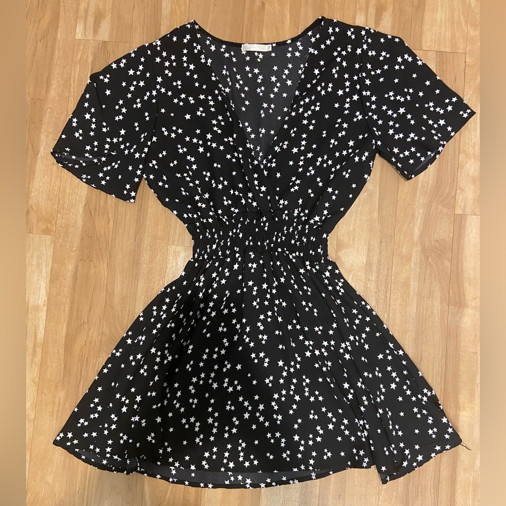 Black mini dress with stars